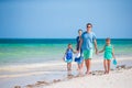 Happy young family beach vacation Royalty Free Stock Photo