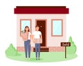 A happy young family bought a new home. A man and a woman are standing with boxes near their homes Royalty Free Stock Photo