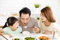 Happy young Family enjoy their lunch Royalty Free Stock Photo