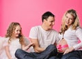 Happy young family expecting a baby