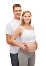 Happy young family expecting child Royalty Free Stock Photo