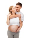 Happy young family expecting child Royalty Free Stock Photo