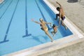 Happy young family have fun on swimming pool Royalty Free Stock Photo