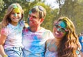 Happy young family on holi color festival Royalty Free Stock Photo