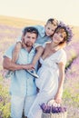 Happy young family in a lavender field