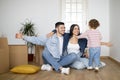 Happy family with little son having fun at new home after moving Royalty Free Stock Photo