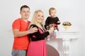 Happy young family, mom dad and little girl Royalty Free Stock Photo