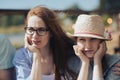 Happy young family- mom,dad and teenage girl daughter traveling together and relaxing in street cafe Royalty Free Stock Photo