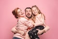 Happy young family with one little daughter posing together Royalty Free Stock Photo