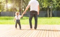 Happy young family, parents daughter and son, unpacking boxes and moving into a new home. funny kids run in with boxes Royalty Free Stock Photo