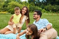 Happy Young Family In Park. Parents And Kids Having Fun, Playing Royalty Free Stock Photo