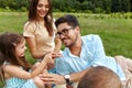 Happy Young Family In Park. Parents And Kids Having Fun, Playing Royalty Free Stock Photo