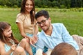 Happy Young Family In Park. Parents And Kids Having Fun, Playing Royalty Free Stock Photo