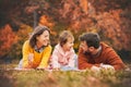 Happy young family smiling and enjoying every moment together Royalty Free Stock Photo