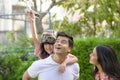 A happy young family spends time playing together Royalty Free Stock Photo