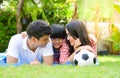 A happy young family spends time playing together Royalty Free Stock Photo