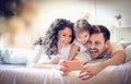 Happy young family take a self portrait with smart phone. Royalty Free Stock Photo