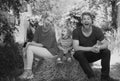 Happy young family of three having fun together launching. Cheerful funny parents playing with son outdoor. Father Royalty Free Stock Photo