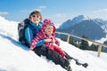 Happy young family in winter vacation Royalty Free Stock Photo