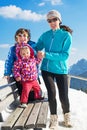 Happy young family in winter vacation Royalty Free Stock Photo