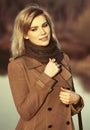 Happy young fashion blond woman walking by the lake Royalty Free Stock Photo