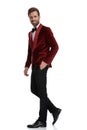 Happy young fashion man wearing red velvet tuxedo Royalty Free Stock Photo