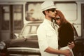 Happy young fashion couple in love hugging in city street Royalty Free Stock Photo