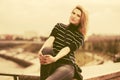 Happy young fashion woman in striped turtleneck t-shirt Royalty Free Stock Photo