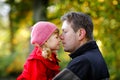 Happy young father having fun cute toddler daughter, family portrait together. Man with beautiful baby girl in autumn Royalty Free Stock Photo