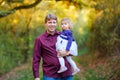 Happy young father having fun cute toddler daughter, family portrait together. man with beautiful baby girl in nature Royalty Free Stock Photo