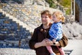 Happy young father having fun cute toddler daughter, family portrait together. man with beautiful baby girl on family Royalty Free Stock Photo