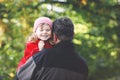 Happy young father having fun cute toddler daughter, family portrait together. Middle-aged Man with beautiful baby girl Royalty Free Stock Photo