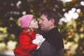 Happy young father having fun cute toddler daughter, family portrait together. Middle-aged Man with beautiful baby girl Royalty Free Stock Photo