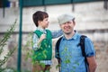 Happy young father and his son having fun outdoors in city Royalty Free Stock Photo