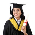 Happy young female student holding diploma Royalty Free Stock Photo