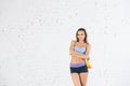 Happy young fitness woman with bananas Royalty Free Stock Photo