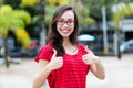 Happy young french woman with glasses