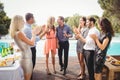 Happy young friends having drinks Royalty Free Stock Photo