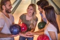 Friends playing bowling