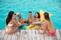 Happy young friends with refreshing cocktails enjoying  party Royalty Free Stock Photo