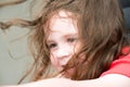 Happy Young Girl on Amusement Ride with Hair Blowing in Wind Royalty Free Stock Photo