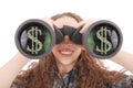 Happy young girl with binoculars and dollars sign