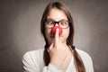 Happy young girl with a clown nose Royalty Free Stock Photo