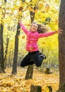 Happy young girl in high jump