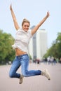 Happy young girl jumping on the Royalty Free Stock Photo