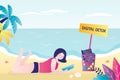 Happy young girl lies on a tropical shore and reads book. Digital detox. All gadgets are thrown into trash can. Refusal of digital