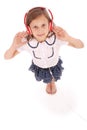 Happy young girl listening to music, view from above