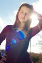 Happy young girl outdoors & sun shine Royalty Free Stock Photo