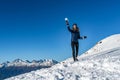 Happy young girl playing snowball fight on the winter snow day