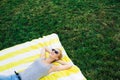 Happy young girl resting on lawn Royalty Free Stock Photo